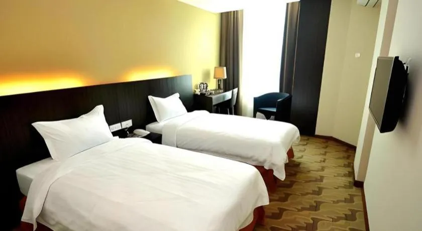 Bed in Eminent Hotel