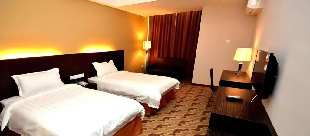 Bed in Eminent Hotel