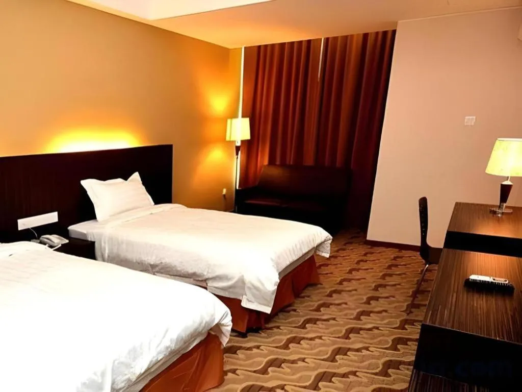 Bed in Eminent Hotel