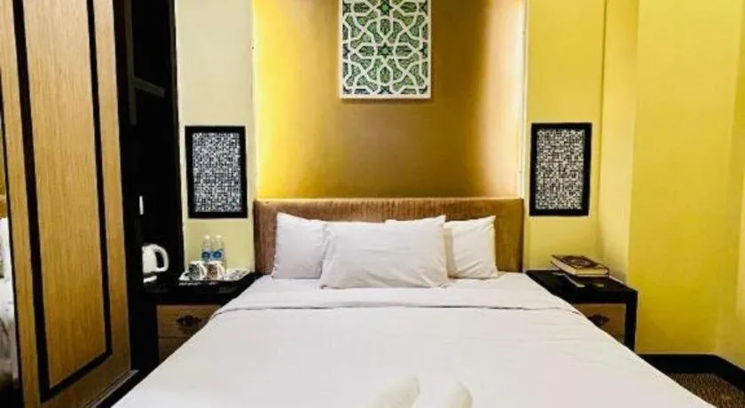 Bed in Hotel El Zahraa