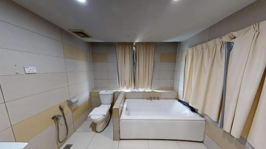 Bed in Hotel Suria Malaqa