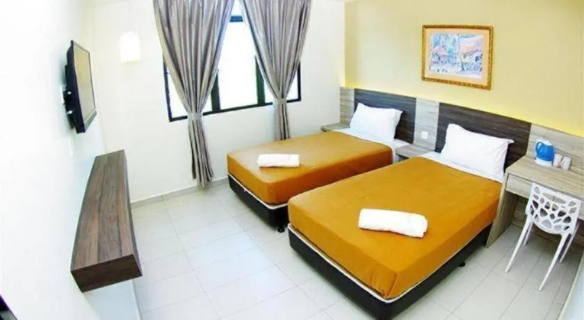 Bed in Hotel Suria Malaqa