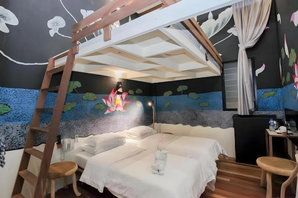 Bed in The Happy 8 Retreat @ Kuala Sepetang