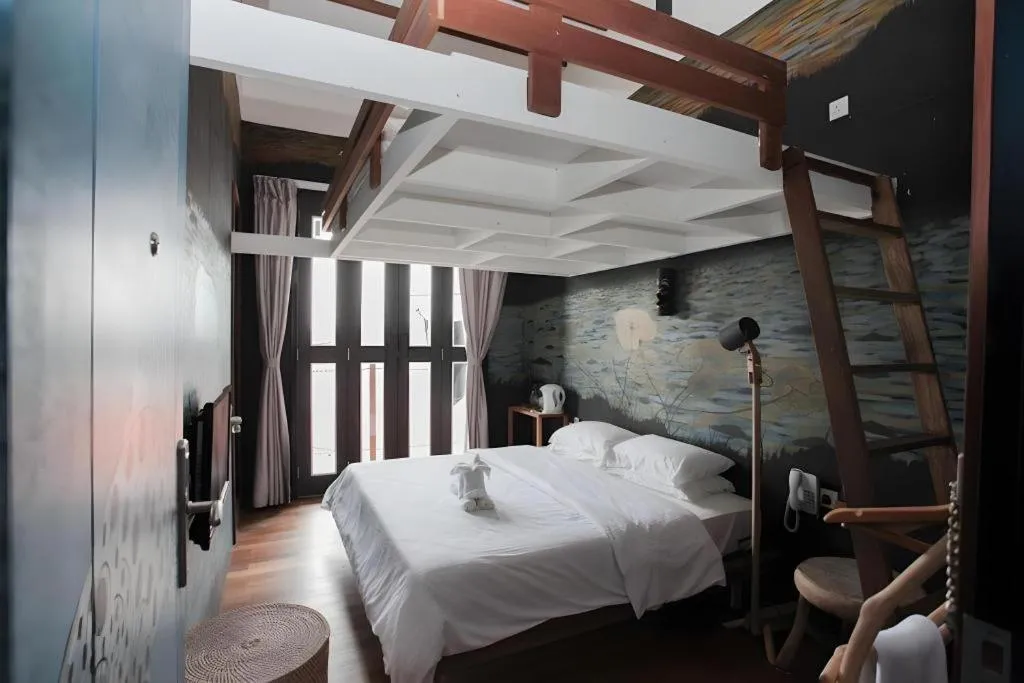 Bed in The Happy 8 Retreat @ Kuala Sepetang