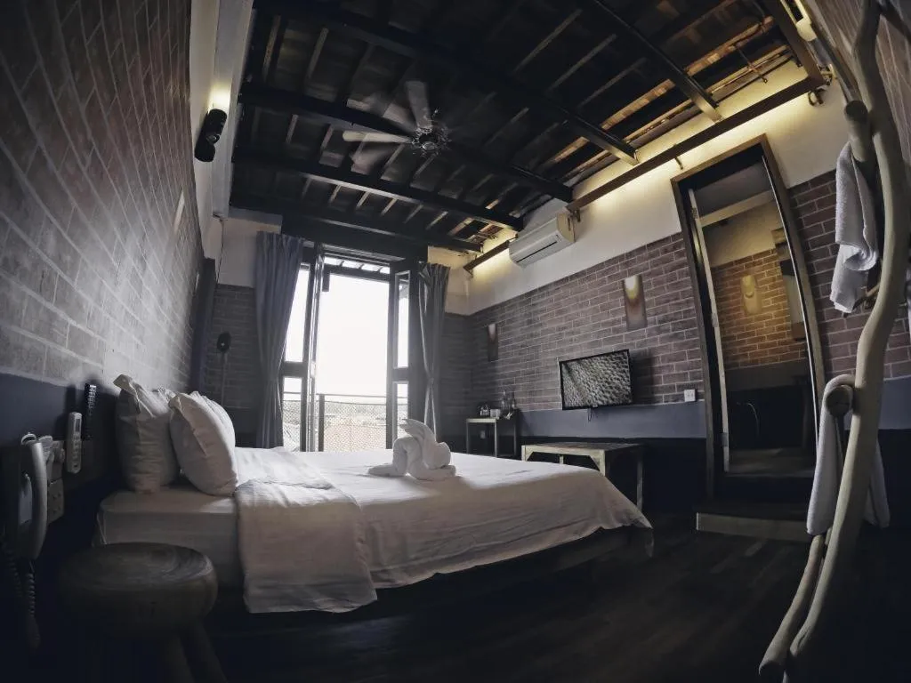 Bed in The Happy 8 Retreat @ Kuala Sepetang