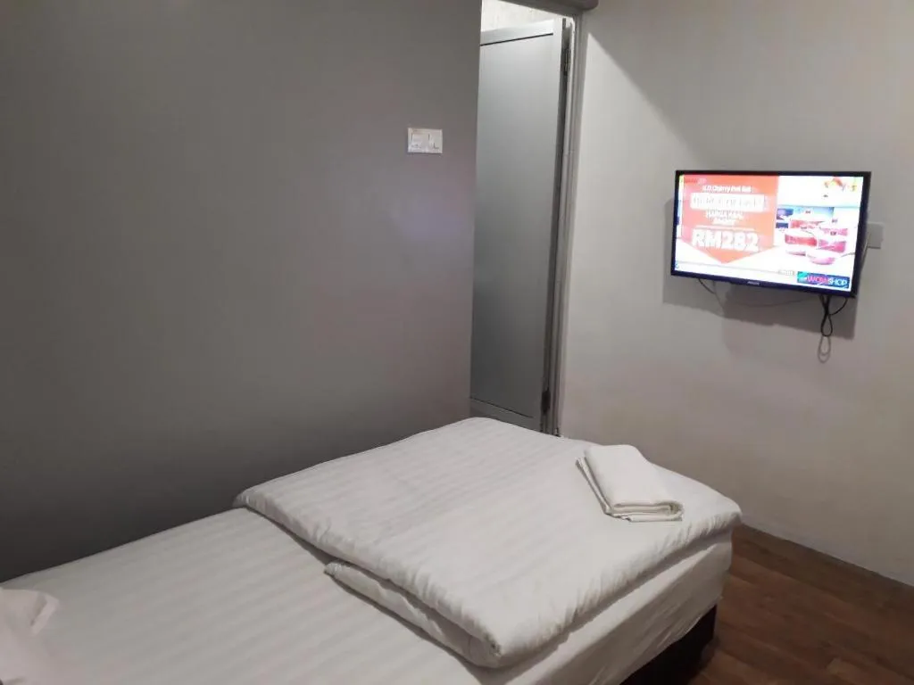 Bed in Hotel Zamburger Bentong