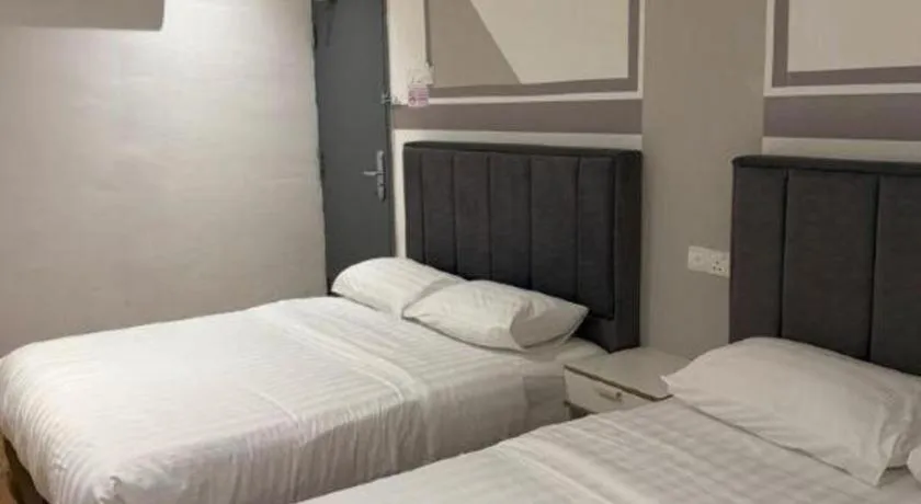 Bed in Hotel Zamburger Bentong