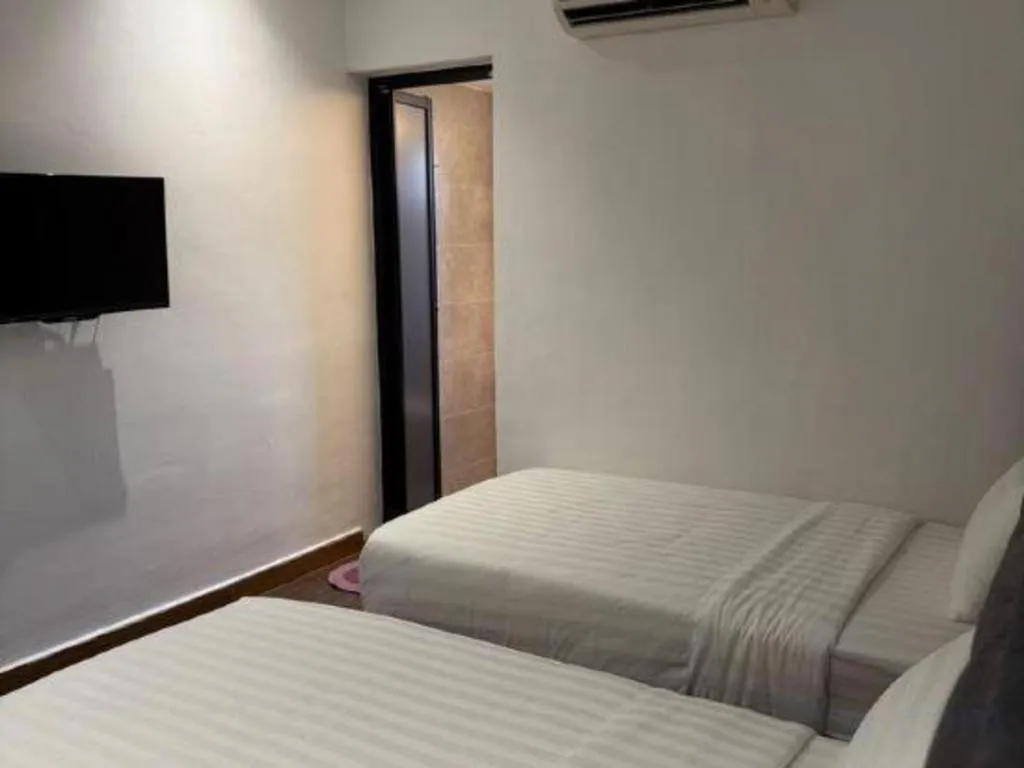 Bed in Hotel Zamburger Bentong