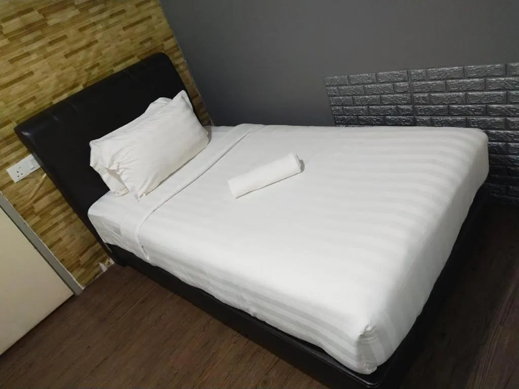 Bed in Hotel Zamburger Bentong