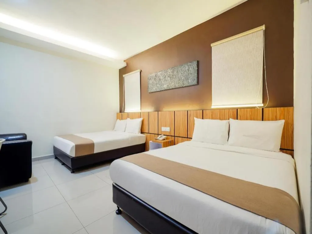 Bed in GM Holiday Hotel Permai Jaya