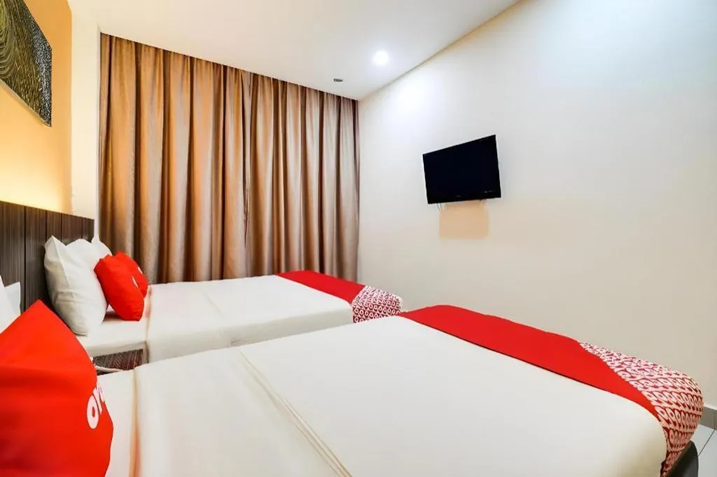 Bed in GM Holiday Hotel Permai Jaya