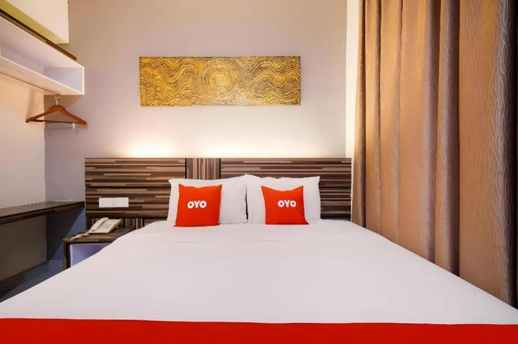 Bed in GM Holiday Hotel Permai Jaya