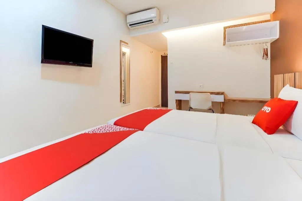 Bed in GM Holiday Hotel Permai Jaya