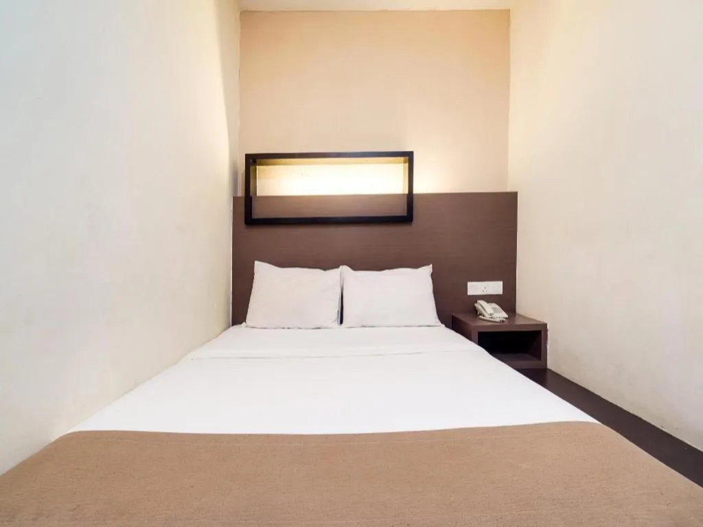 Bed in GM Holiday Hotel Permai Jaya