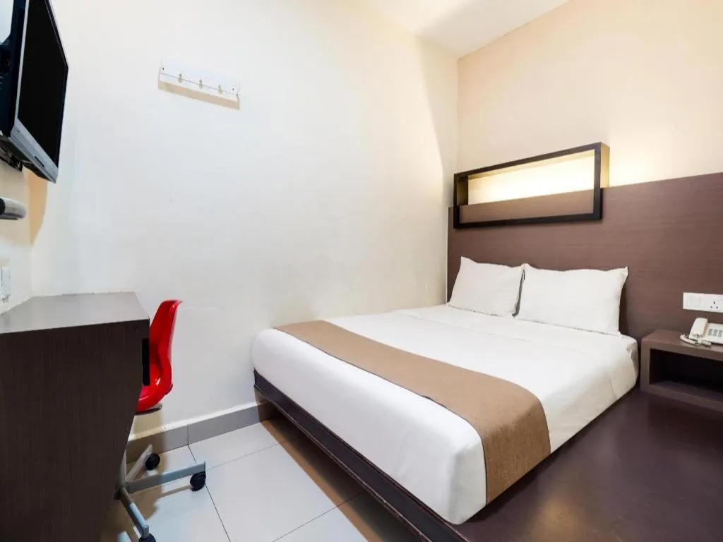 Bed in GM Holiday Hotel Permai Jaya