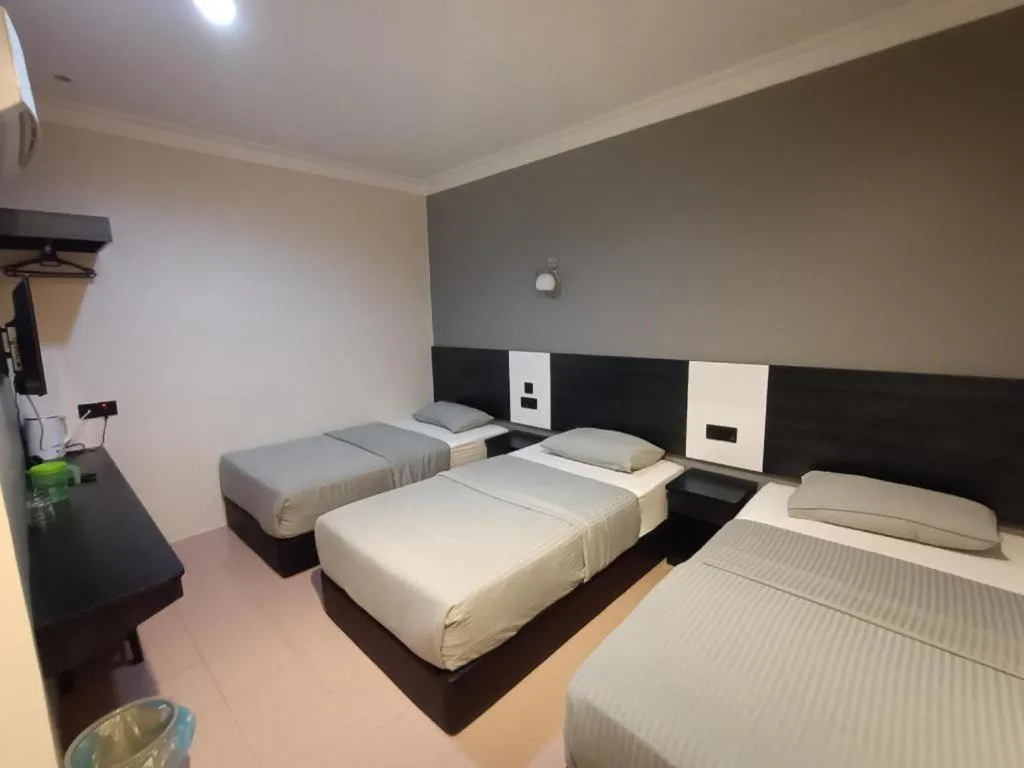 Bed in Sherrinton Hotel