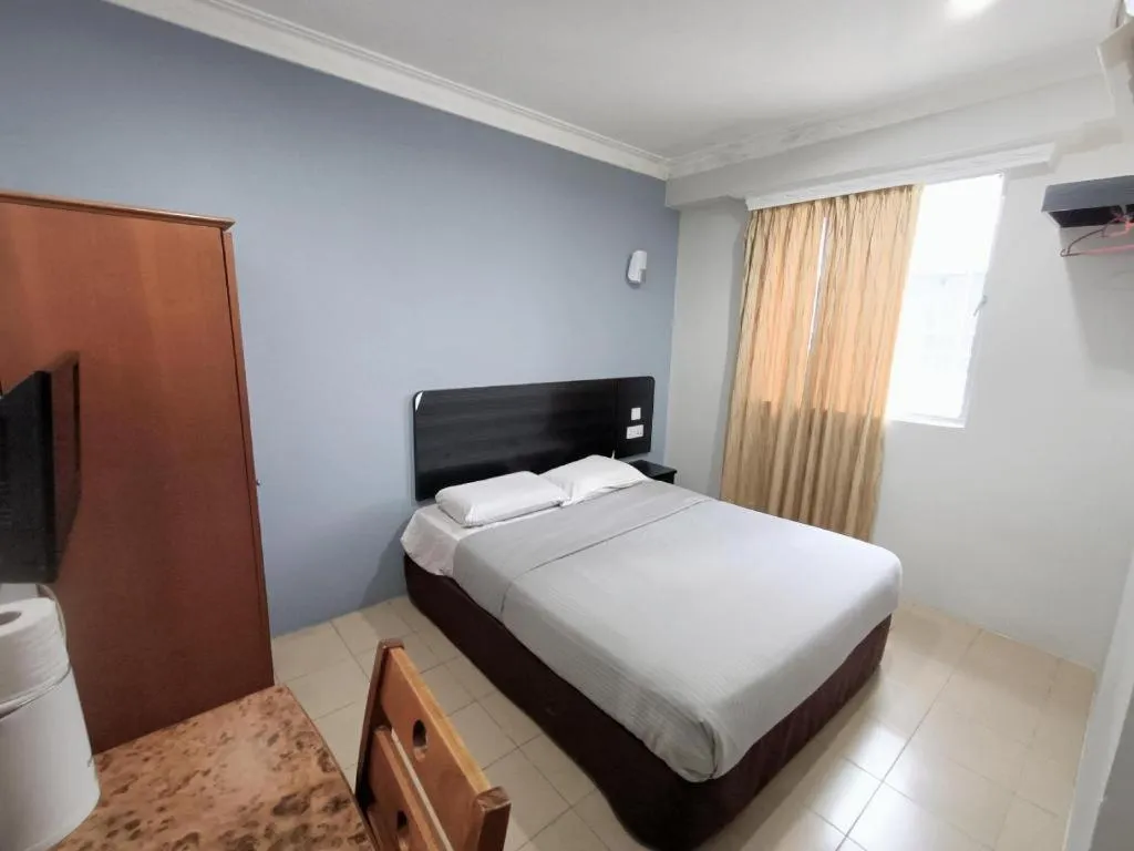 Bed in Sherrinton Hotel