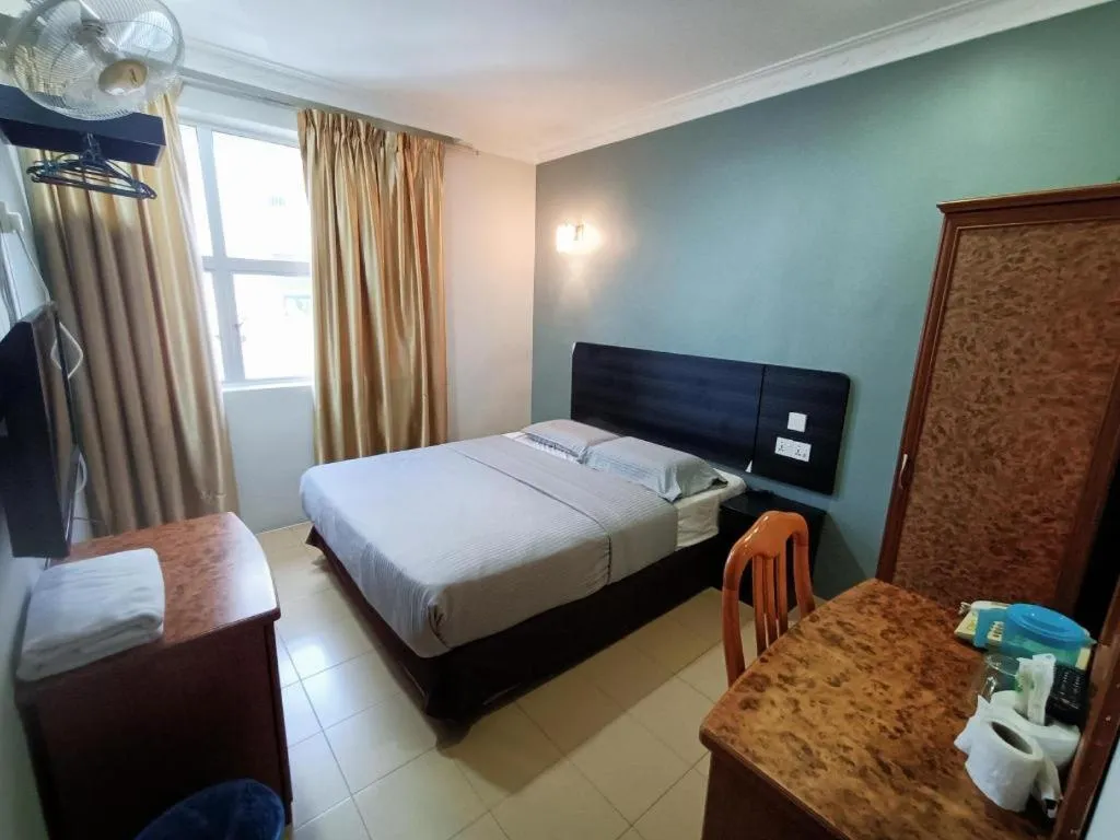 Bed in Sherrinton Hotel