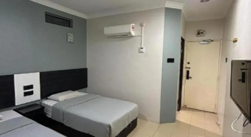 Bed in Sherrinton Hotel