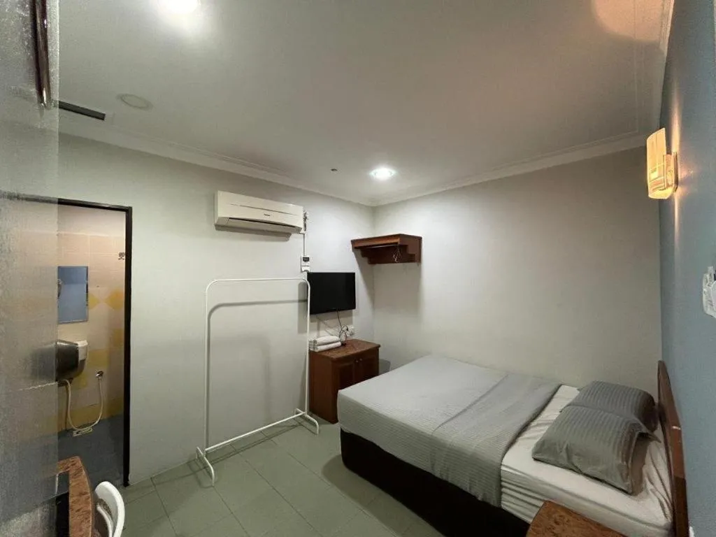 Bed in Sherrinton Hotel