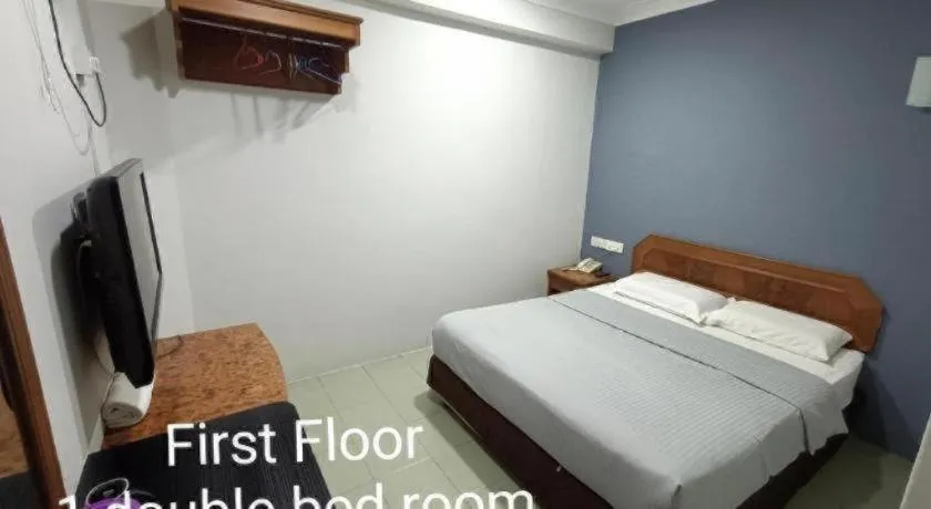 Bed in Sherrinton Hotel