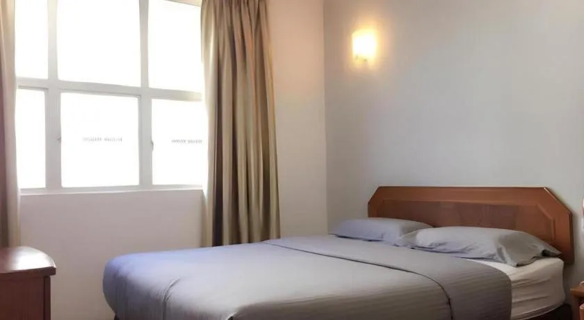 Bed in Sherrinton Hotel