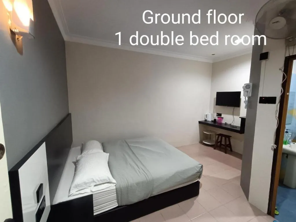 Bed in Sherrinton Hotel