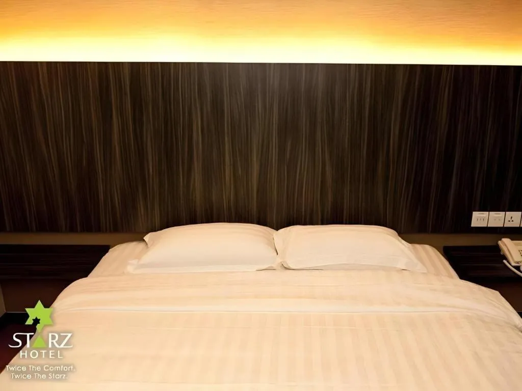 Bed in Starz Hotel