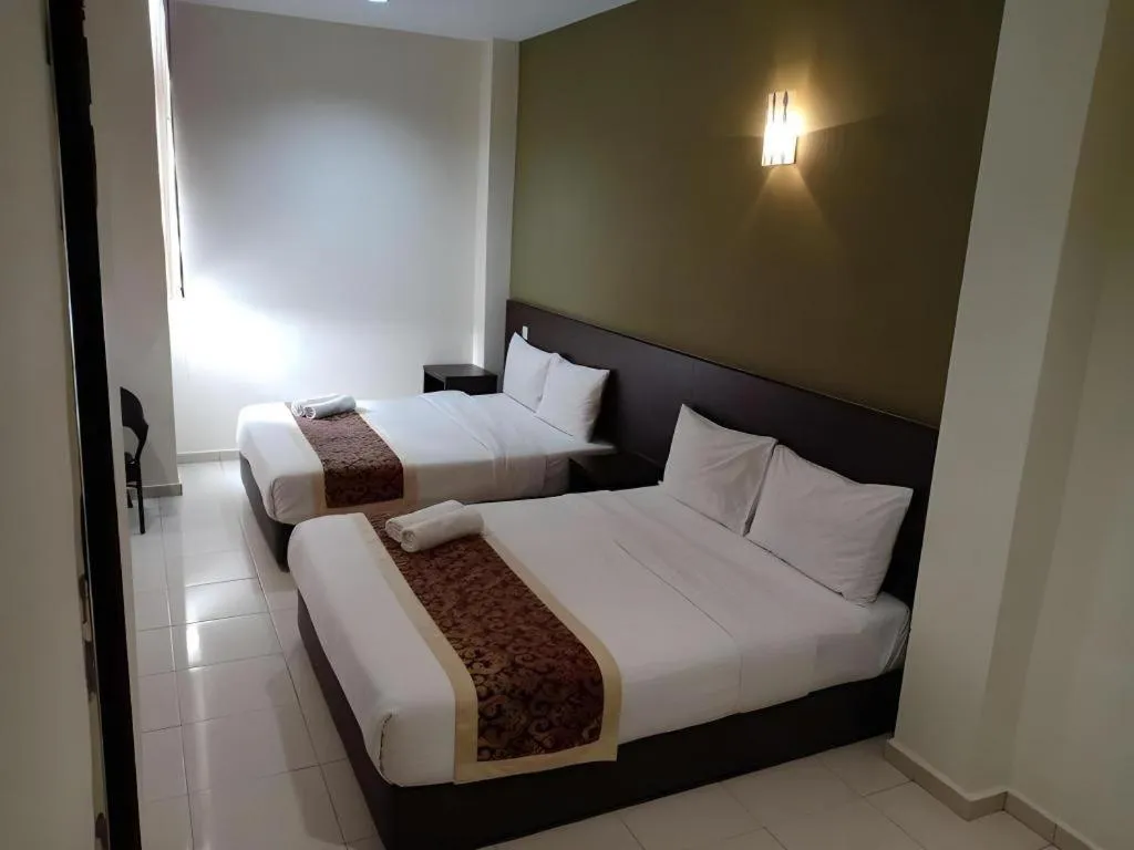 Bed in Inn Home Hotel Muar