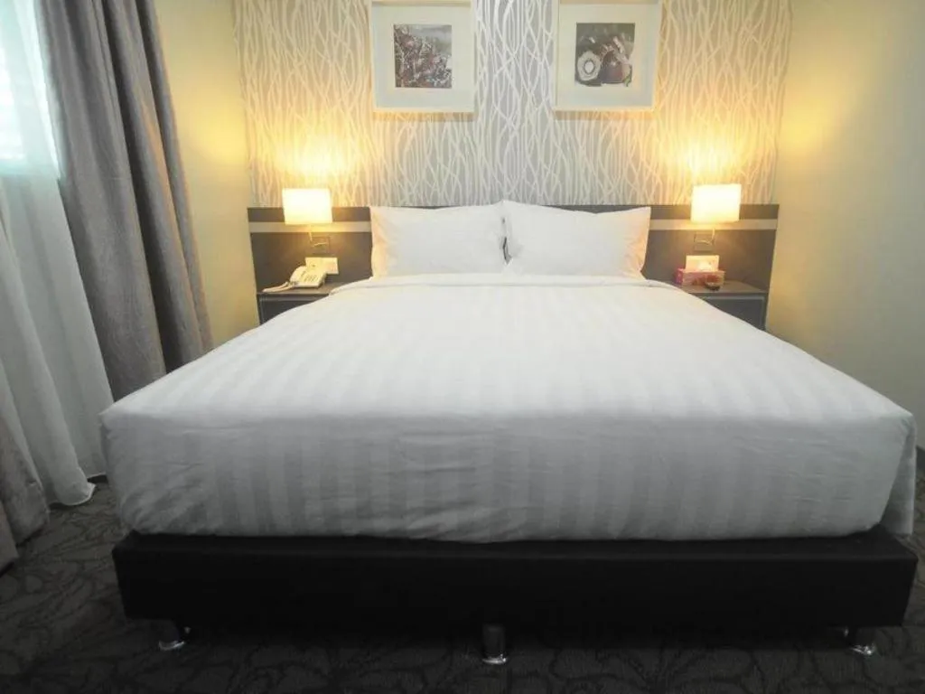 Bed in Kosma Boutique Hotel
