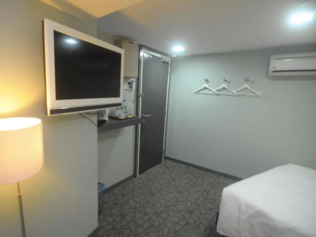 Bed in Kosma Boutique Hotel