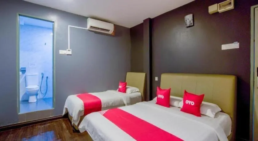 Bed in OYO 89895 Senses Budget Hotel
