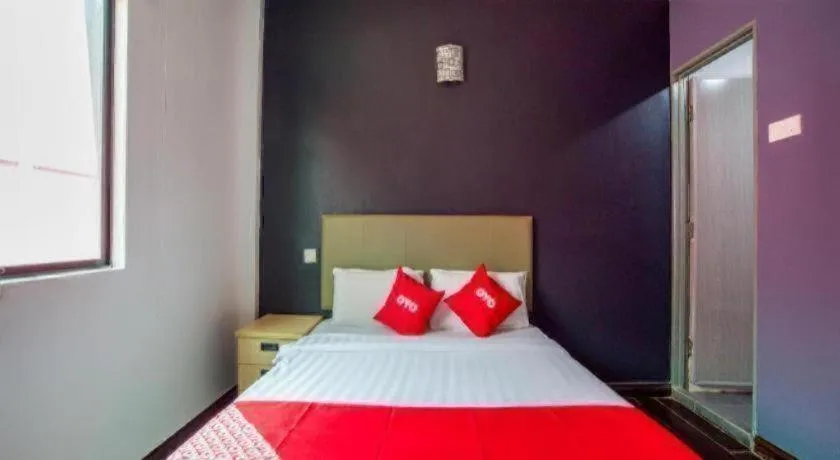 Bed in OYO 89895 Senses Budget Hotel