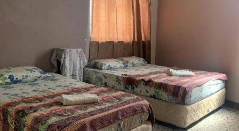 Bed in Sun Golden Inn