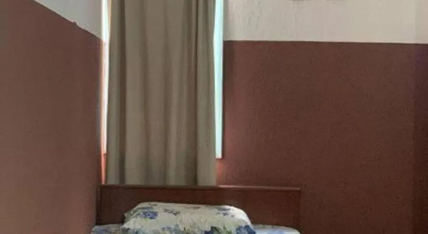 Bed in Sun Golden Inn