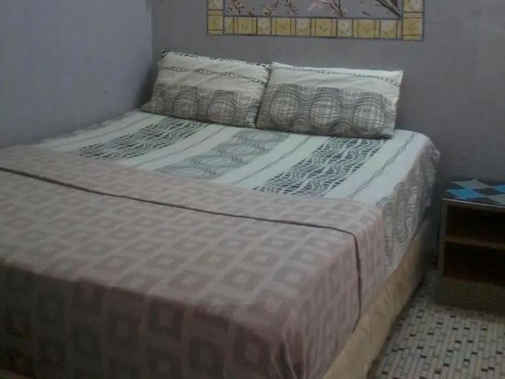 Bed in Sun Golden Inn