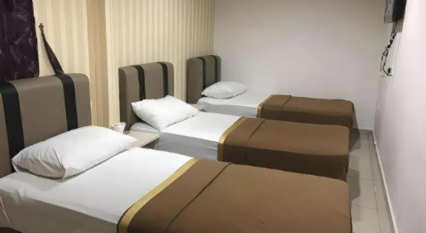 Bed in RST Hotel