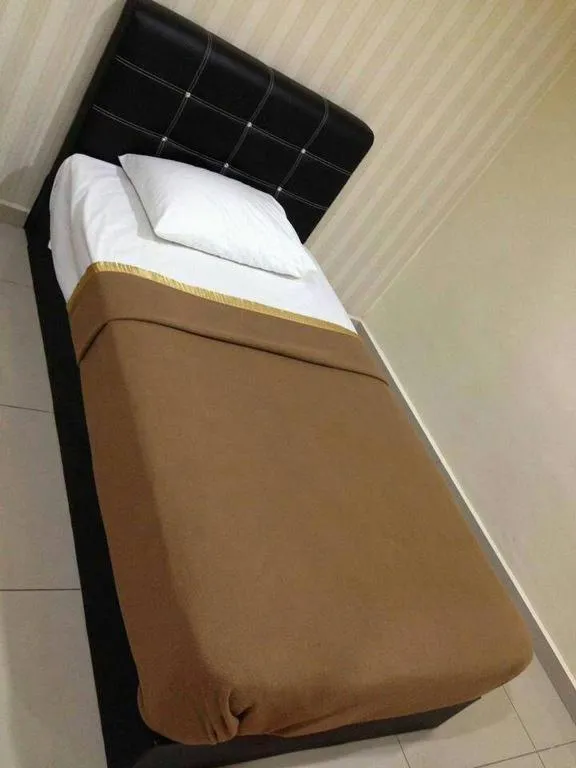Bed in RST Hotel