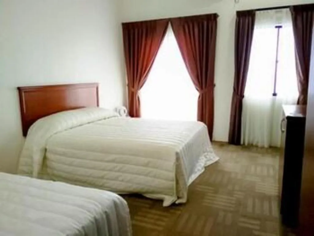 Bed in Sportfishing Hotel