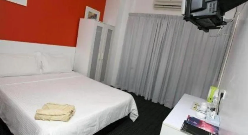 Bed in Capital O Ridel Hotel Kota Bharu