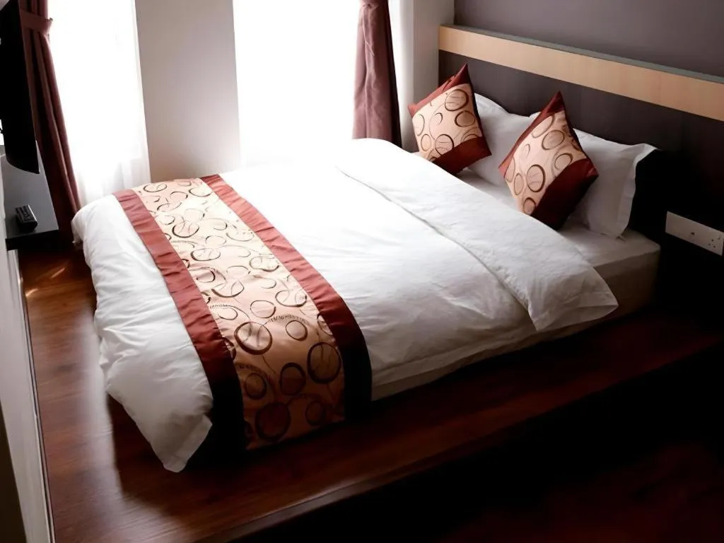 Bed in Lot 10 Boutique Hotel