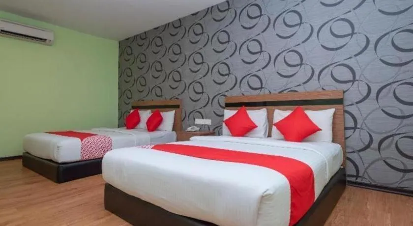 Bed in Hotel Aromas Kulai