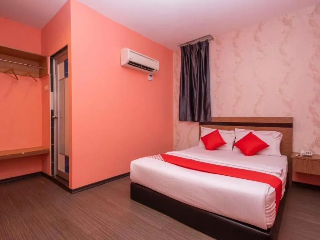Bed in Hotel Aromas Kulai