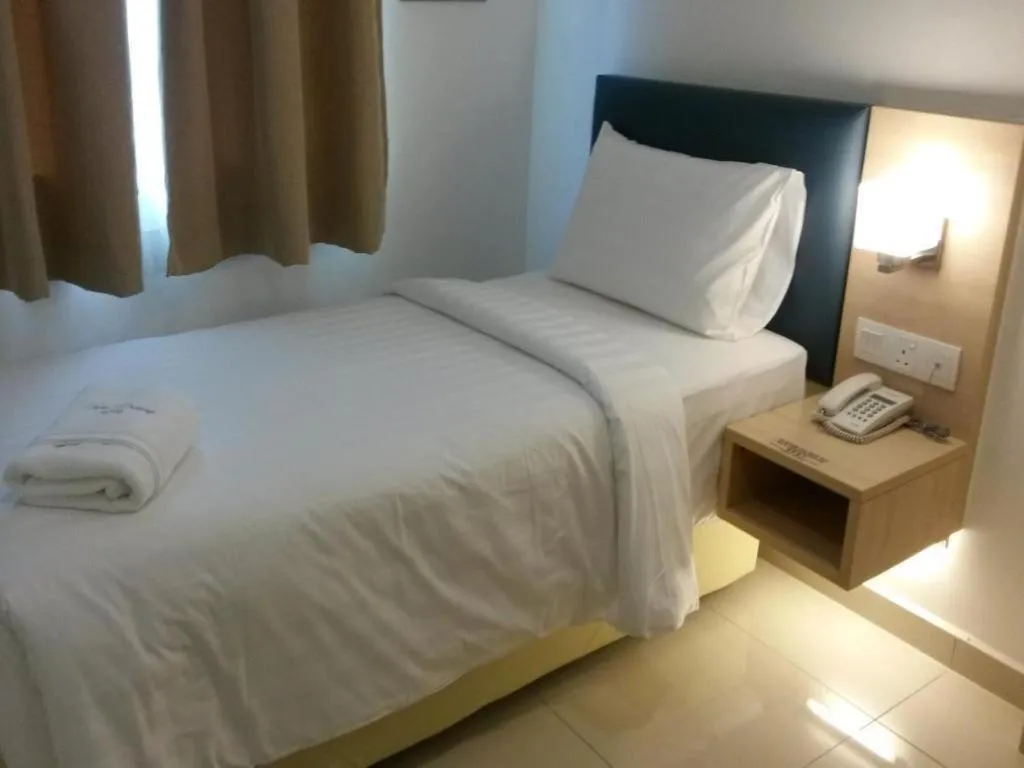 Bed in Hotel Pudu Bintang