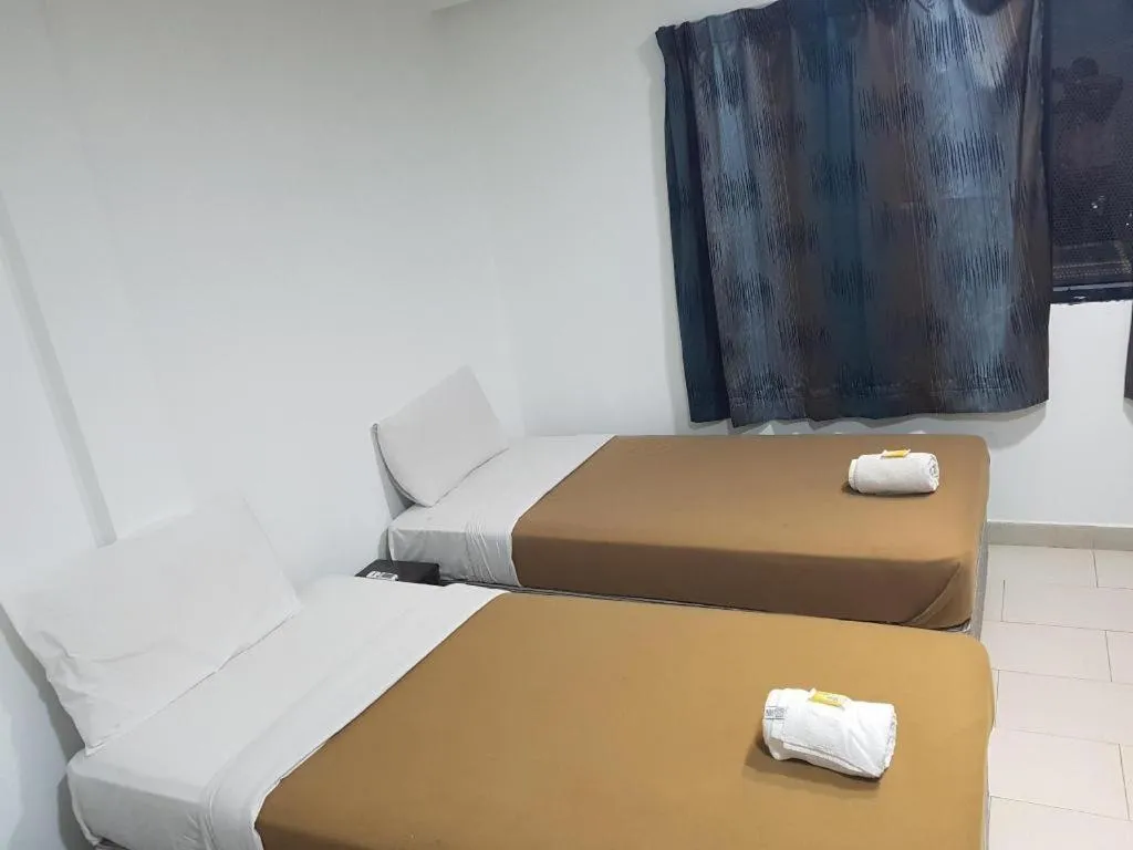 Bed in Hotel Grand Mutiara