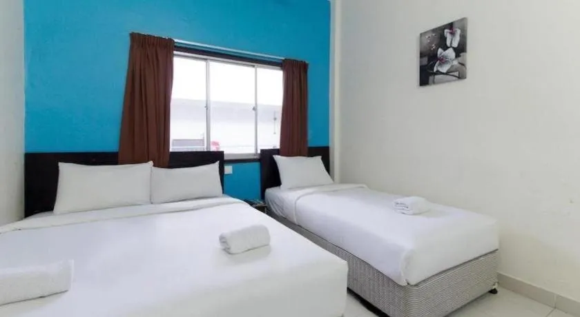 Bed in Hotel Grand Mutiara