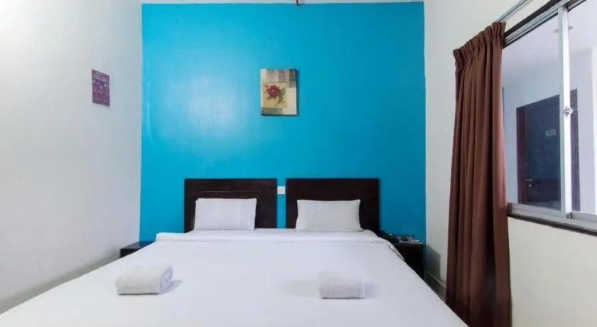 Bed in Hotel Grand Mutiara