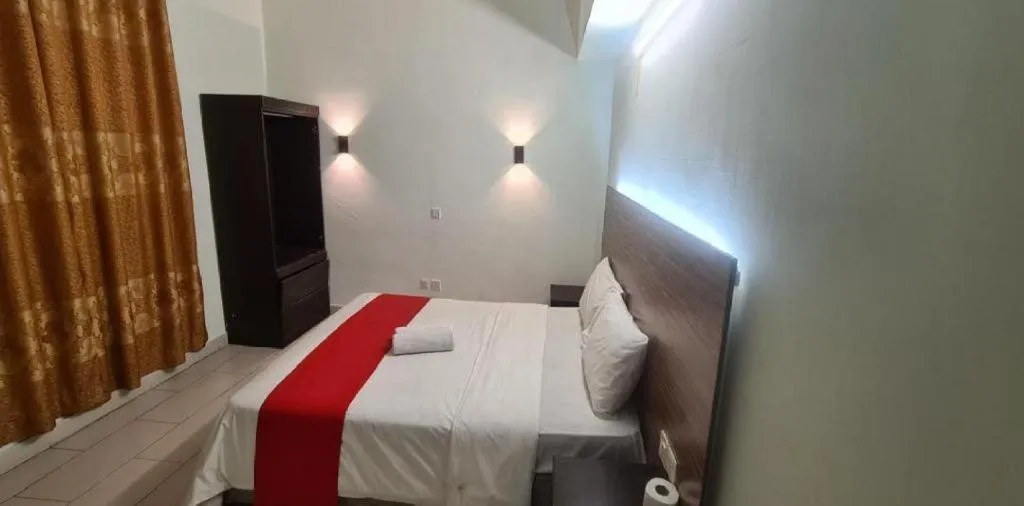 Bed in Hotel Grand Mutiara