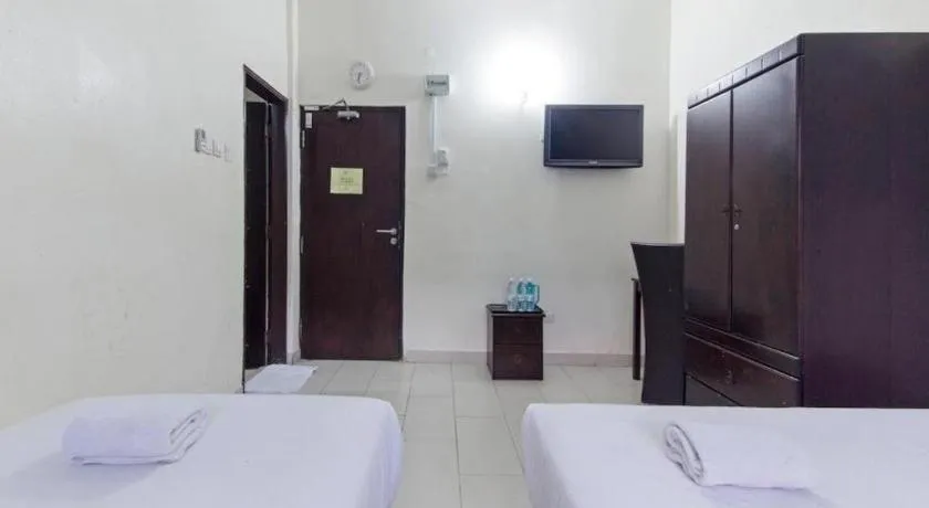 Bed in Hotel Grand Mutiara