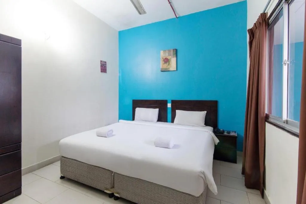 Bed in Hotel Grand Mutiara